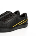Męskie sneakersy ze skóry z kontrastowymi paskami czarno-żółte 92-M-511-1