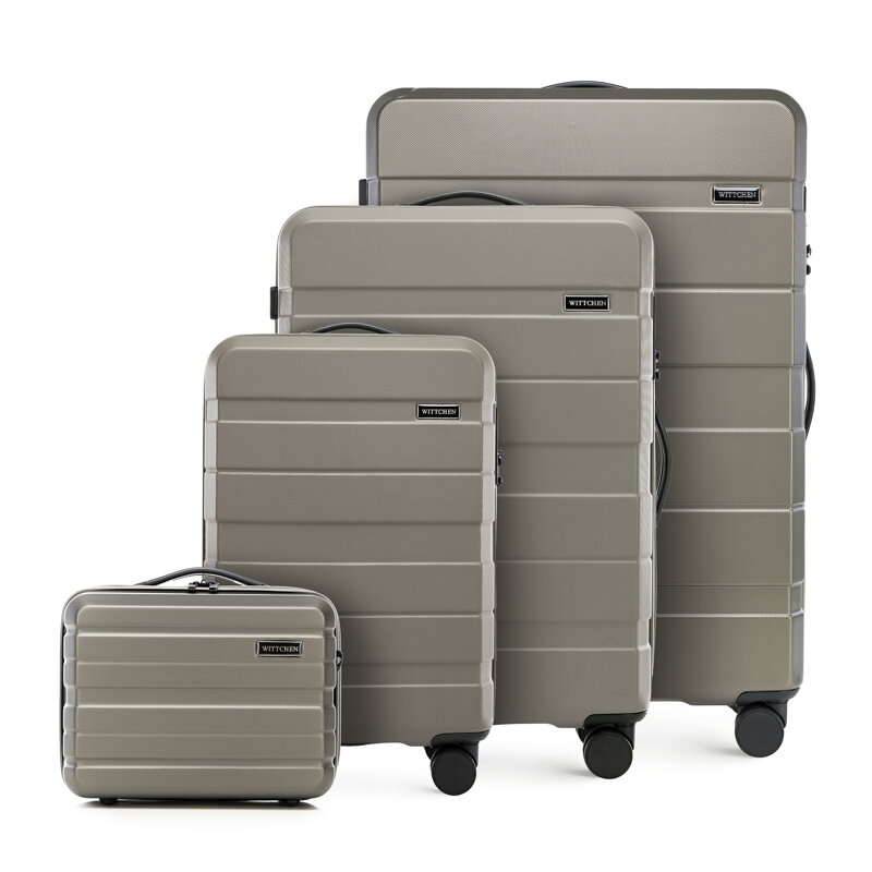 Komplet walizek z ABS - u w poziome pasy szampański 56-3A-10K-86 Komplet walizek z ABS - u w poziome pasy szampański 56-3A-10K-86